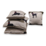 Grey cushion with black dog with red leash- for baby/kids
